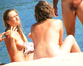 A few more girls on the plage where most chicks keep their tops on. 2