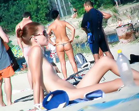 I just love being on the plage nude. It gets me in such a horny mood. 2