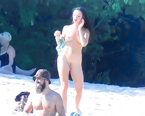 I love to show off my trophy wife, especially on the beach where she just teases me and everybody around her!!.