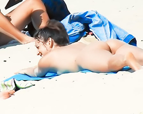 Nude beach girl wants to get a ten on her ass and her back
