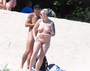 nude and showing everything at the beach in hk as some guys watched. 2