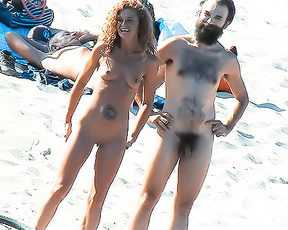 Sexy redhead was burning up the beach and was she ever hot!!!!.