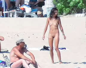 The best place to show your tattoo. On the nude beach. Look at these tattoos!.
