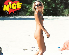 And briefly (no pun intended) the only bottomless woman on the plage.0