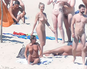 This german woman with her partner was settling in a corner of a nude plage while my lens capture her. She saw me, and didn't care. Good