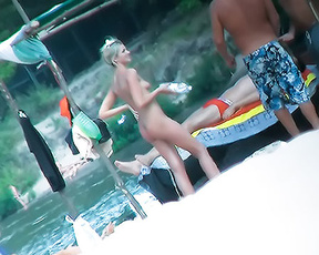 While walking the plage one morning I came across this woman wanting to show her assets off. Thank goodness for zoom lens!. 2