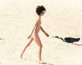 White Visor and Sandy Shoreline on a Quiet Nudist Beach