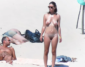Two Naturists Sharing a Towel on Sandy Nude Beach