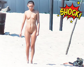 One Slim Nudist Standing Near Wooden Beach Posts