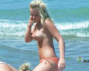 Sluty young nudist whores love to hang out together on a beach 3