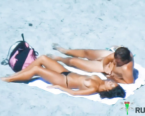 A local on orient strand. Great tan walked right up to her she just looked at me and closed her eyes. Probably used to us american pervs!. 3