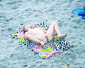 Patterned Beach Towel on the Sand at a Nude Beach