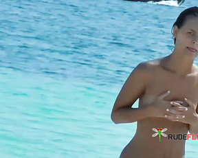 Calm Women Reclining Sunbathing Topless on Greek Island Beach