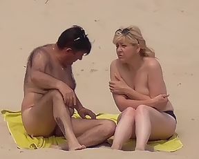Busty chick shows her naked body at the nude beach 2