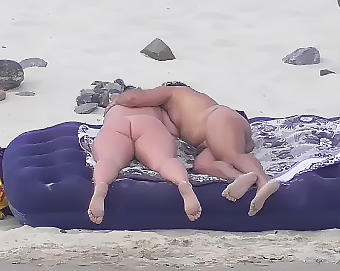 All eyes are on this youthfull naturist as she sunbathes 7