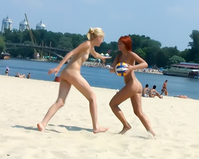 Playful young nudists have fun at the hot nude beach