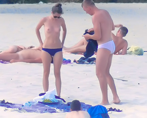 A day at the beach. Nudist couples. Hope you enjoy.