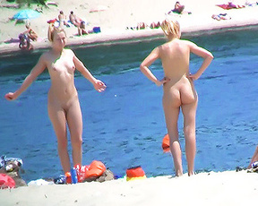 Bombastic nude beach girl enjoys a beautiful sunny day