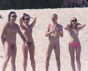 Nude beach girl filmed enjoying a sunny day at the beach