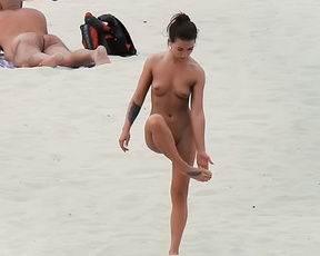 Young nudist with big boobs loves spending time at the beach