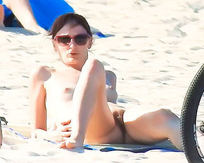Dazzling nudist teen with a killer body caught on a hidden camera at the beach.