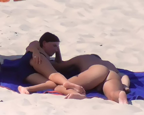 Curvy nude beach girl enjoys her day