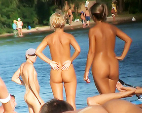 Young nudist babes enjoy their day at the beach while being secretly filmed.