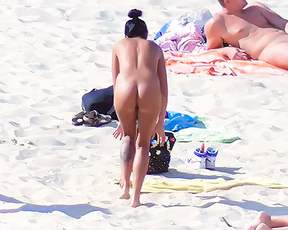 Same voluptous teen leave the beach in very see through clothes. I think she look very sery so!.