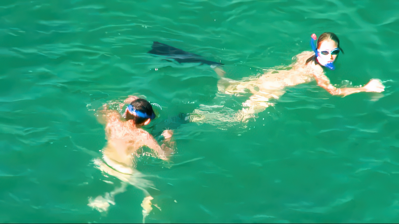 Woman embracing beach nudism calmly 3