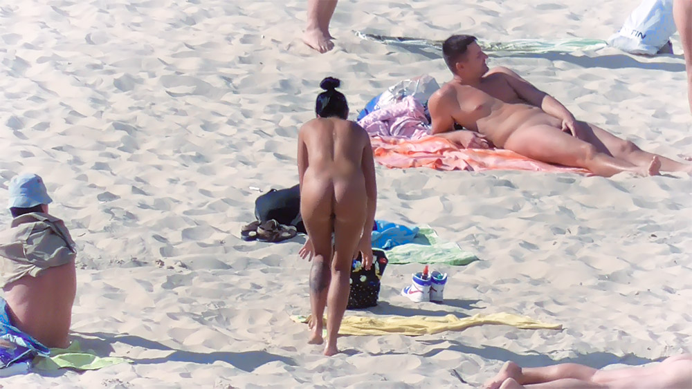 Same voluptous teen leave the beach in very see through clothes. I think she look very sery so!.
