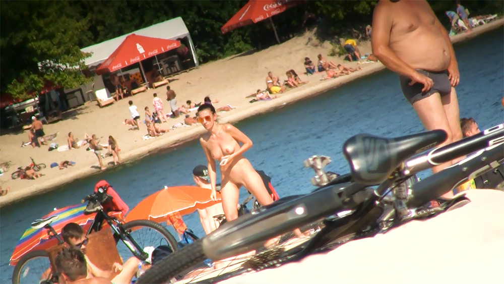 Standing in Shallow Water at a Nude Beach