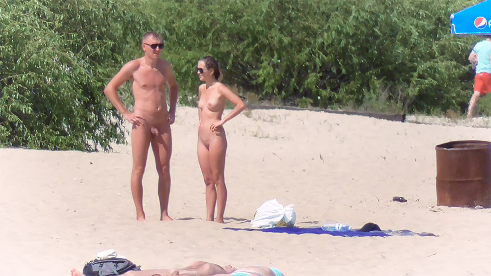 Me and my hubby, we were naked on a public plage working out our tan. Wile some people pass by; and took this vids. Enjoy it!.