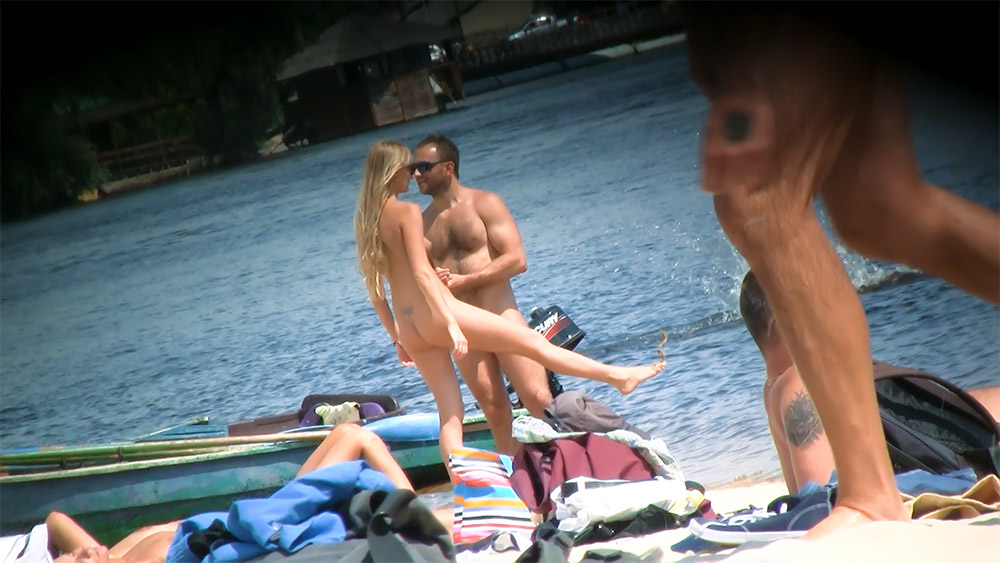 Breathtaking nudist teen caught on a secret camera lying on the beach naked.