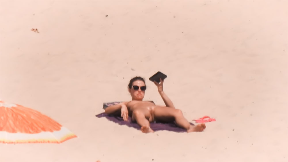 Breathtaking nudist teen flashes her seductive curves on a hidden camera.
