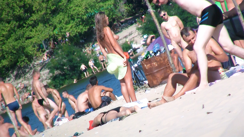 Her boobs are out in the open, and she's loving the whole feeling.