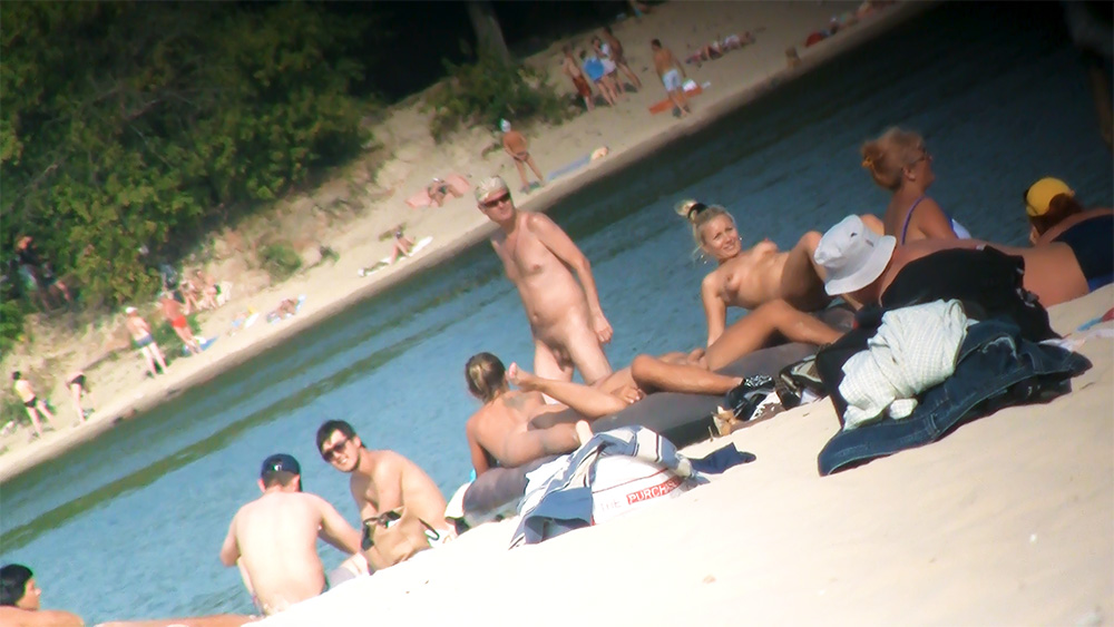 Five Naturists Sitting Beside a Poolside Ledge