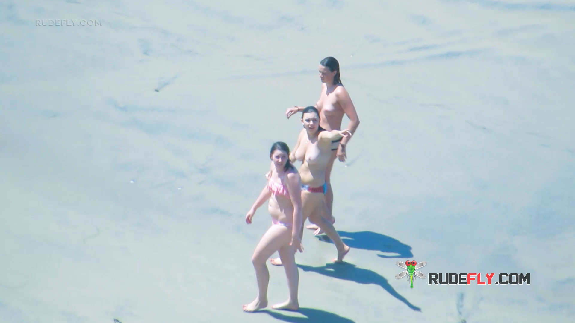 Three Women Walking Topless Beach Shallows
