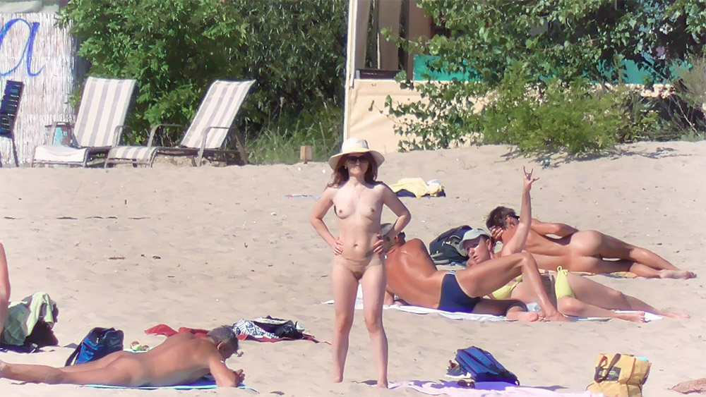Standing Hands on Hips at a Sunny Nude Beach