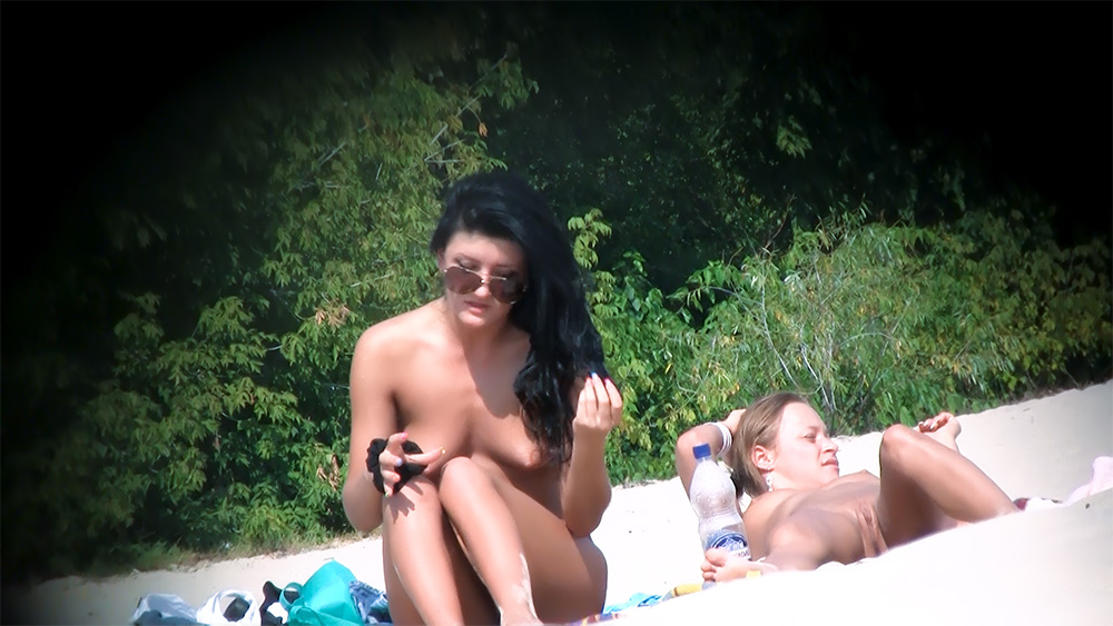 Sluty young nudist whores love to hang out together on a beach 2