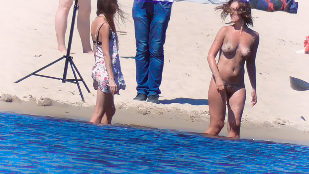 A saw this woman posing to her husband on a nude beach  ahh
