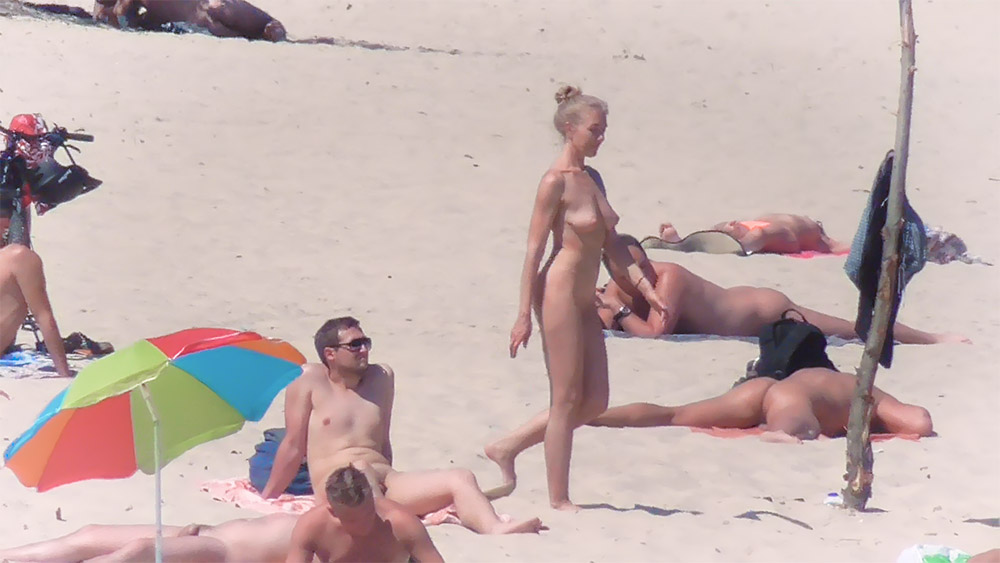 she gets up to join her friends in the water.