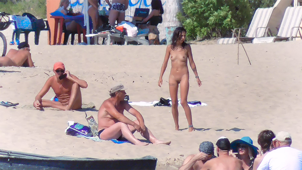 The best place to show your tattoo. On the nude beach. Look at these tattoos!.