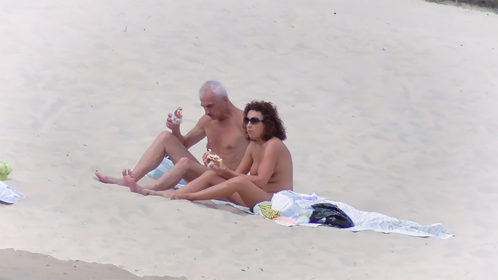 A very nice day at the beach.the boaters kept getting closer for a better look.