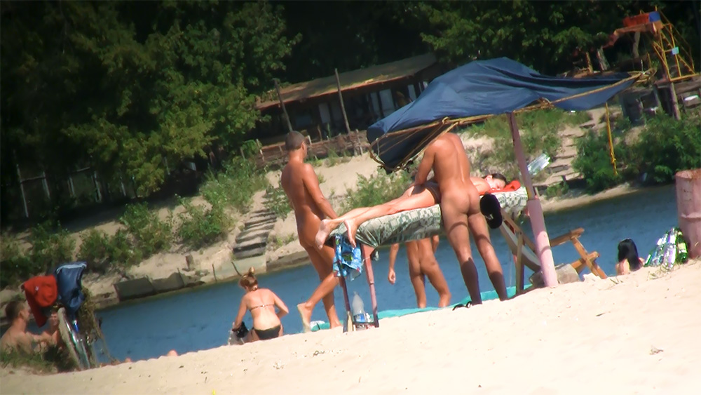 loves being topless at the beach