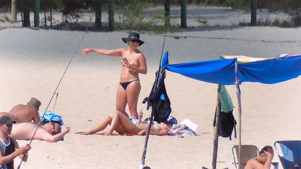 Just a few vids of my wife going nude on a beach for the first time, if you like them we will post some more. 3