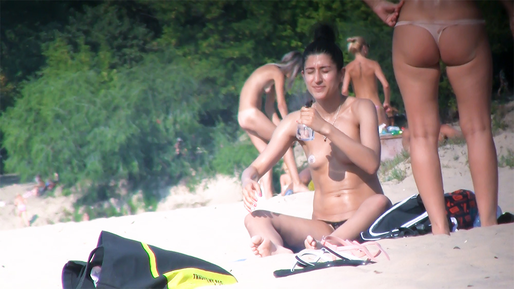 Just a lazy day at the beach and I took some video of some hot teens. Let me know what you think as I have tons more.