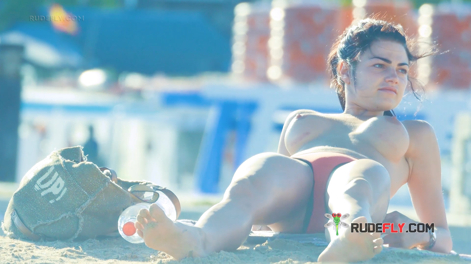 Harmonious Women Enjoying the Sun Bare-Topped at Catalan Beach