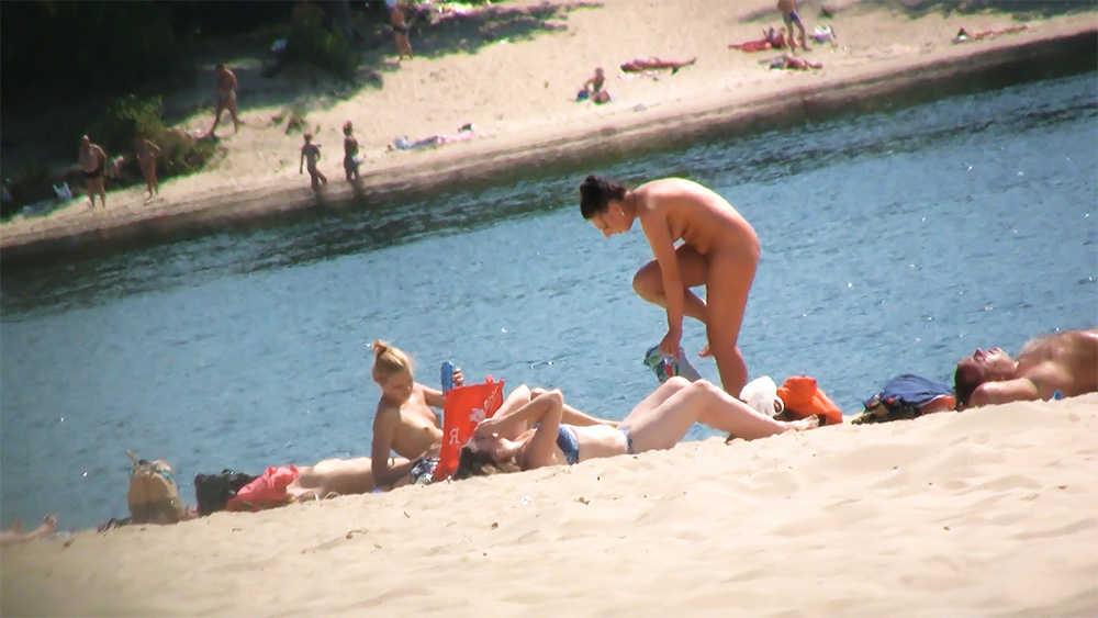 Out on the beach,, we love the outdoors,, nude,, and sometimes,, some fun.