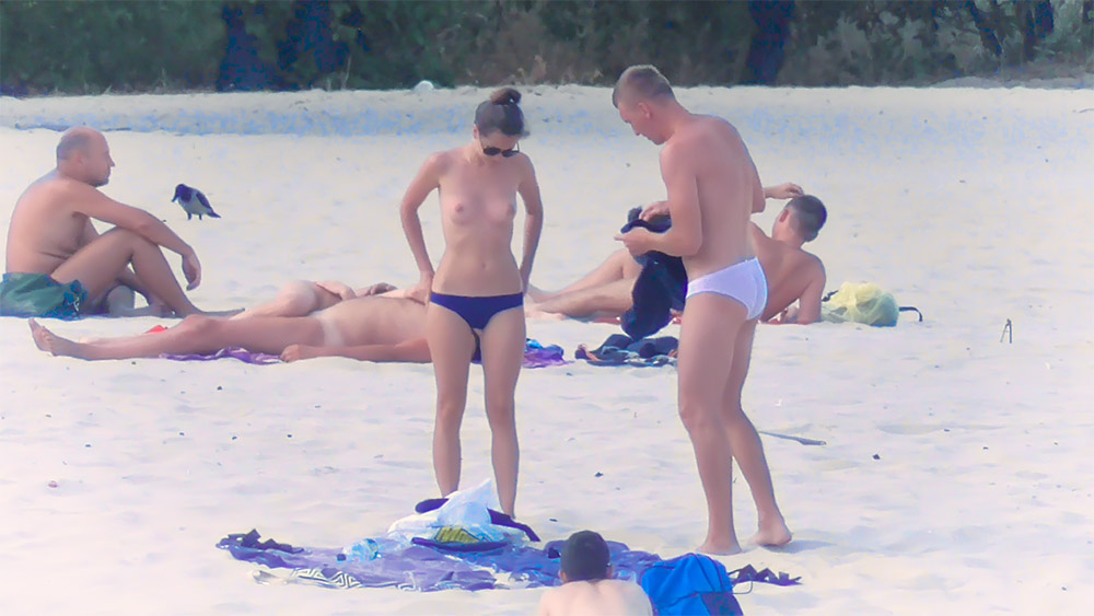 A day at the beach. Nudist couples. Hope you enjoy.