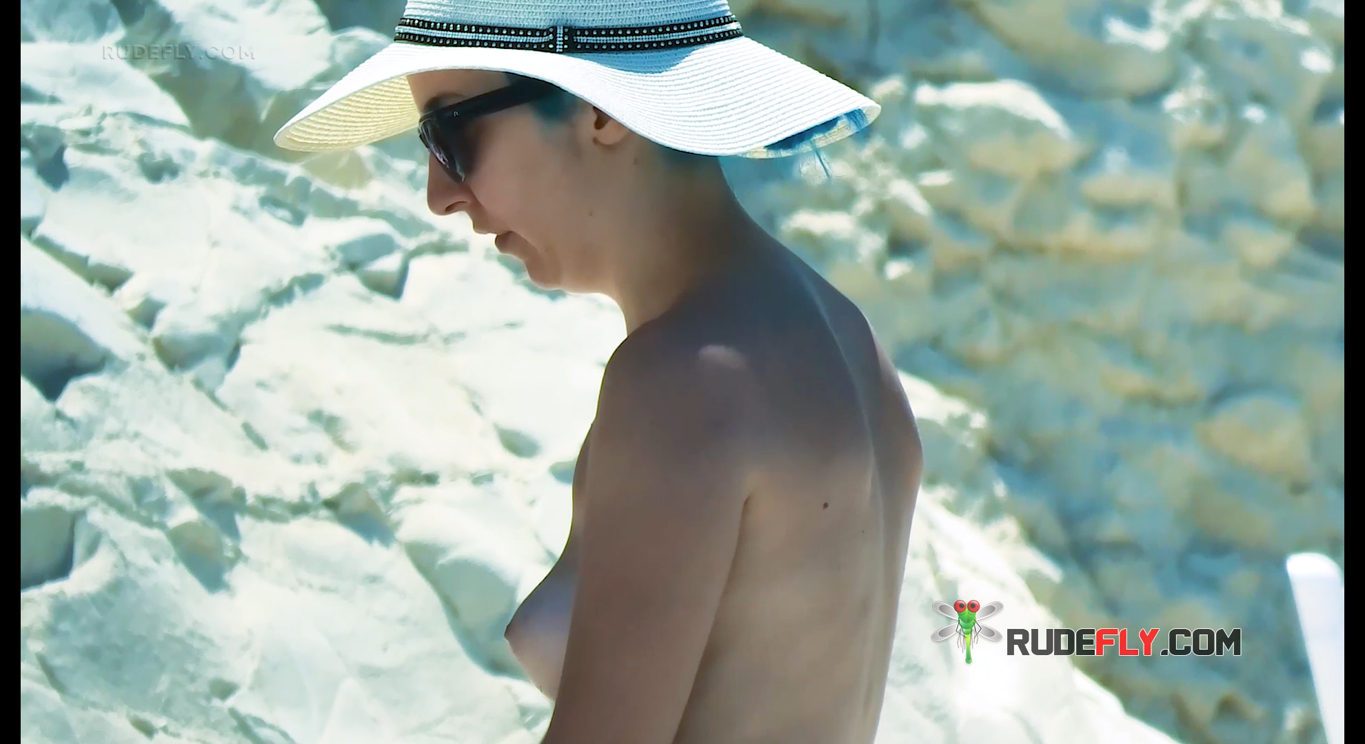 Gentle Tourists Reclining Relaxing Topless on Alicante Beach 7